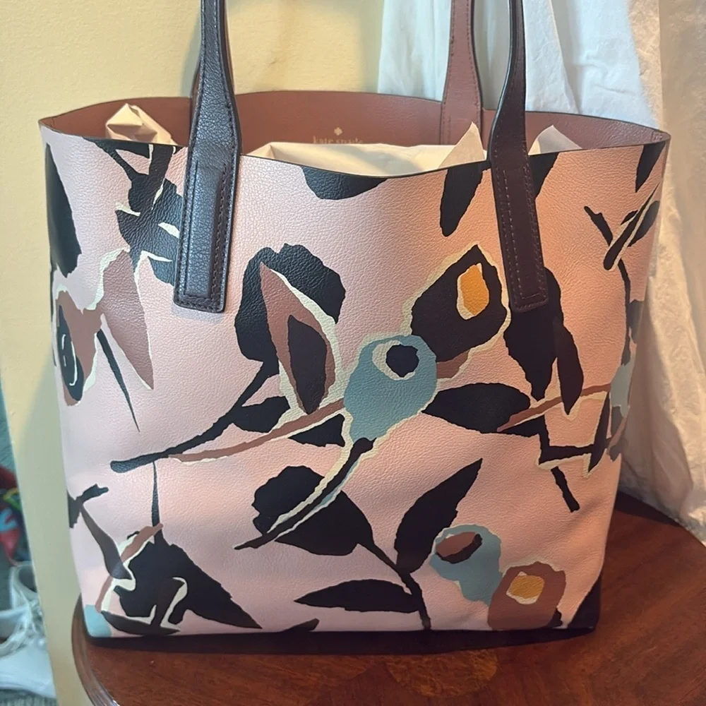Kate Spade    Tote   Pink, multi color, leather inside and out  abstract floral